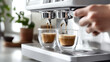 © Zahra - Brewing espresso in to glass cups silver coffee espresso machine white and clean interior. Barista working with coffee machine and making espresso coffee, speciality coffee black arabica