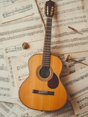 Poster - Musical setup featuring an acoustic guitar surrounded by scattered sheet music and a tuning fork in a cozy practice space. Generative AI