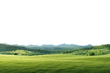 vast green landscape with rolling hills and mountains under a clear blue sky during the daytime
