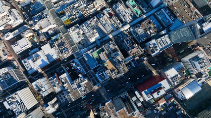 Wall Mural - aerial view, city, urban, town, scenery, landscape, overhead view, drone, road, traffic, society, directly above, forward, construction, progress, real estate, building, group of buildings, business, 