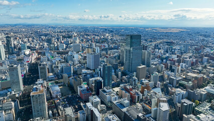 Leinwandbilder - city, urban, landscape, scenery, town, aerial view, society, prospect, drone, business, economy, era, real estate, bird eye view, high-angle, panorama, horizon, seen from above, looking down, blue sky