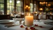 © kinkin - Romantic candlelit dinner table setting with wine glasses, plates, cutlery, and rose petals.