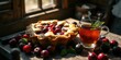 © kavalin - A rustic still life featuring a freshly baked fruit pie, a cup of tea with a sprig of mint, and a scattering of ripe plums, all bathed in warm, golden sunlight.