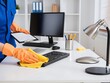 © Coloropal - Professional office cleaning service person using cleaning equipments