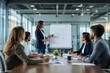 © Pixels Hunter - Business team meeting in a modern office with a woman presenting on a whiteboard.