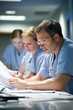© Юля Бурмистрова - Collaboration among cardiac surgeons during planning for a complex surgical procedure in a modern operating room