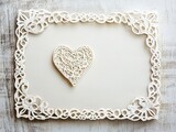 Elegant handmade heart filigree greeting on white envelope for weddings