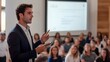 © AnamulHaqueAnik - Confident Young Businessman Giving a Presentation to Attentive Audience in Modern Conference Room