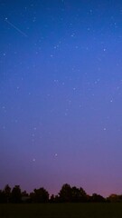 Wall Mural - Moonrise Above Summer Filed. Night Countryside Summer Starry Night Sky landscape. Night Starry Sky Galaxy natural background. time night. video night nighttime. Glowing Stars. Glow Of Sky Stars
