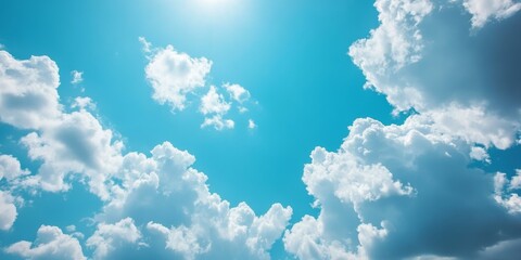 Poster - Blue sky and white clouds create a serene background, perfect for various themes and settings, enhancing the visual appeal of any image with a blue sky and white clouds ambiance.