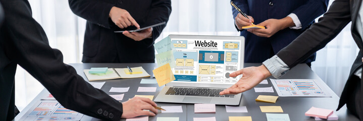 Analyst team use sticky note for creative and analytic brainstorm for business idea with BI data dashboard on laptop screen. Analysis financial data visualization tech for marketing strategy. Prodigy