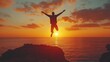© Design By Reiga - Silhouette of a man jumping joyfully at sunset over ocean.