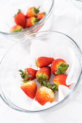 Wall Mural - Washed and Dried Strawberries Neatly Stored in a Glass Bowl