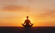 © Surachate - Serene Yoga Silhouette, a figure gracefully practicing yoga at sunset, embodying tranquility and inner peace against a vibrant sky.