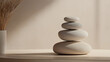 © iamfrk7 - Zen stack of smooth beige stones in peaceful neutral setting with minimalist aesthetic for wellness, meditation, and relaxation concepts in interior design