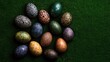 © MrsNoopin - A collection of Easter eggs with intricate patterns displayed on fresh green grass