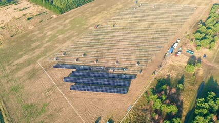 Wall Mural - Renewable energy solar farm assembly view