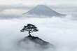 © pham - 富士山を背景にした雲の中に立つ孤独な木とその美しい風景