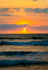 Poster - Bright red sunset over the tropical sea.