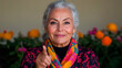 © El So - A smiling elderly woman of European descent, wearing a colorful scarf  pointing with finger.