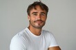 © Donna - Confident Happy Middle Aged Man in White T-Shirt Smiling on Isolated Studio Background