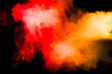 Wall Mural - A red and orange cloud of smoke is blowing through the air