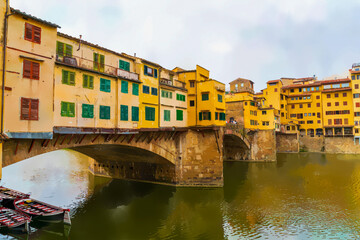 Florence, Italy. Watercolor illustration. Ponte Vecchio - Medieval arched bridge with souvenir and jewelry shops. Summer day