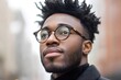 © senyumanmu - Young Black Man with Glasses Looking Upward