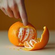 © อรุณ สตามัน - Slicing a juicy orange fruit preparation kitchen food photography indoor close-up culinary art