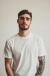 © Alexandr - Man in white T-shirt posing