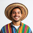 © twentyone - Smiling man wearing colorful poncho and straw hat, isolated