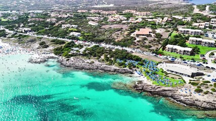 Wall Mural - Aerial perspective of Sardinia's Torre della Pelosa and crystal-clear waters of La Pelosa Beach