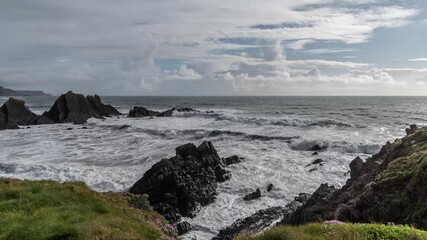 Wall Mural - Beautiful 4K Timelapse of Hartland Quay on Cornwall coast during Winter sunset