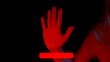 © kinomaster - Woman touches glass screen panel, open palm print on transparent surface, red light scanner scanning the hand print. Template for digitalization concept.