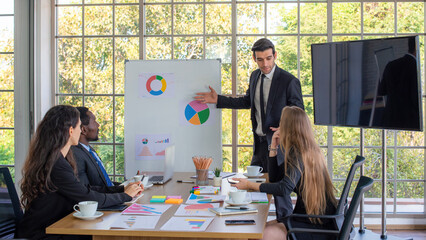 collaboration is a key to best results. group of young modern people in smart clothing wear planning