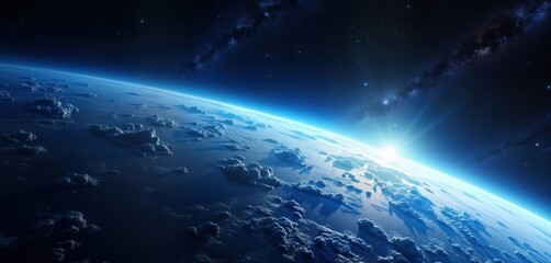 Wall Mural - view of earth from outer space. planet glows with sunrise. vast expanse of space, clouds. celestial 