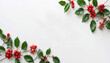 © Nuraya - Christmas holly berries on white copy space