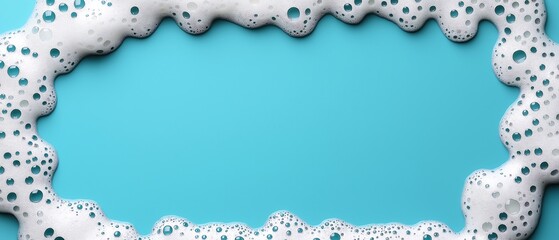 A vibrant blue background framed with white foam bubbles, perfect for beverage-related themes, showcasing freshness and cleanliness in drinks or soaps.