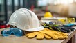 © DigitalSpace - Safety Gear A closeup of a safety helmet resting on a table surrounded by various personal protective equipment like gloves and goggles emphasizing the safety protocols in place
