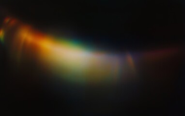 Wall Mural - radiant light spectrum over black background with lens flare effects in high detail