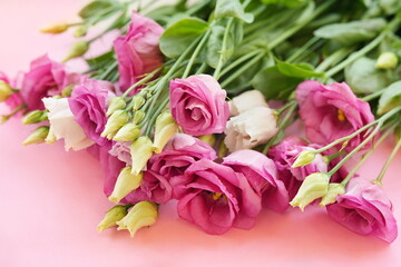 Wall Mural - Delicate blooming festive eustomas summer flowers, blossoming lisianthus (prairie gentian) flower background, bright bouquet floral card, selective focus