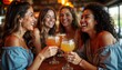 © Viktor - Four happy women celebrate with cocktails at bar. Cheer, laugh together. Lively social scene. Setting appears to trendy bar eatery. Could weekend gathering casual celebration. Look cheerful, relaxed.