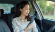 © PTD - woman fastening her seatbelt in car, emphasizing safety and focus