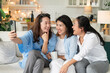 © Yingyaipumi - Happy group Asian middle-aged women smile take a selfie in home living room.Happiness lifestyle group of Asian mature adult friendship reunion having a great party at home.friendship reunion concept.