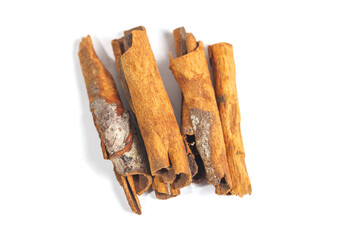 Cinnamon stick isolated on white background. Cinnamon bark is a spice obtained from the inner bark of several species of trees of the genus Cinnamomum that is used for sweet and savory dishes.