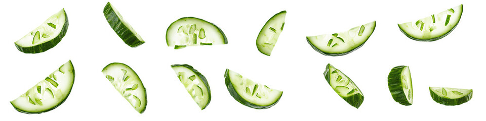 Wall Mural - cucumber slices falling on white background