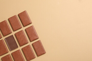 Poster - Brown chocolate bars on a light background