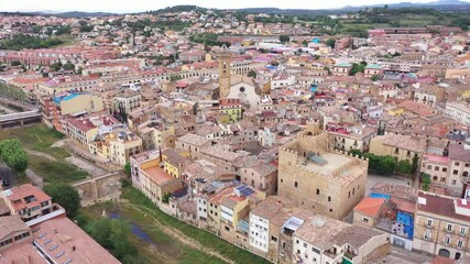 Wall Mural - Summer view from drone of center of medieval Spanish town of La Bisbal d Emporda with episcopal palace castle and Church of Santa Maria, province of Girona, Catalonia