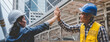 © aFotostock - Banner Engineer team high five together on construction site. Team Partner Business Trust Teamwork Partnership. Industry contractor fist bump dealing business. Mission team meeting hands high five