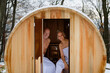 © Halfpoint - Senior couple using small sauna during cold winter day. Spa weekend getaway for elderly people.